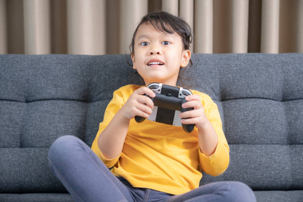 Girl enjoy with video game at home
